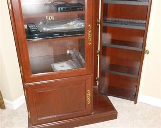 Nice small TV  stand w/DVD holders & shelves