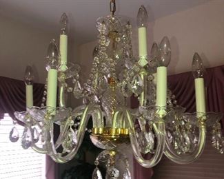 2 of these pretty shiny chandeliers. Casual dining room