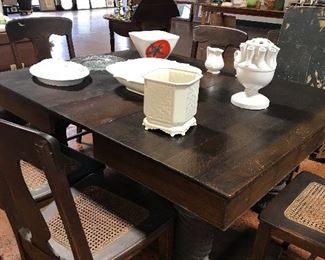 Massive table with several leaves.