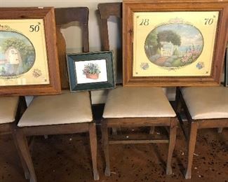More framed prints on oak chairs