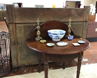 Pretty half round table.  Blue and white items.