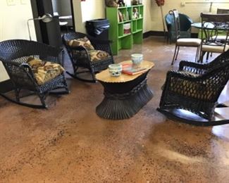 Nice three piece wicker set.  Unusual heavy stick table.