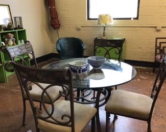 Great condition glass top table with four sturdy chairs.