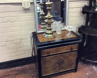 One of two Chinese style chests with one of many lamps and crystal.