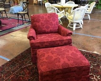 Comfy arm chair with ottoman.
