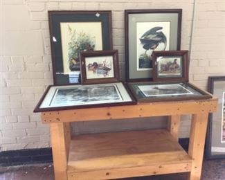 Lovely framed prints ready to hang plus wooden rolling table for sale.