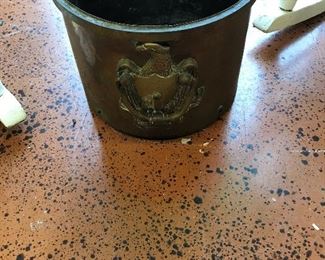 Brass cache pot with eagle handles.