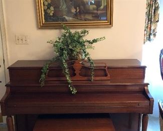 Janssen upright piano, $250