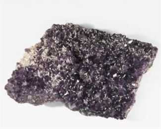 Giant, Grade A+ Amethyst from Uruguay featuring white Quartz clusters throughout. Would be beautiful on a table or inside the fireplace 30" x 21" x 9" $1200