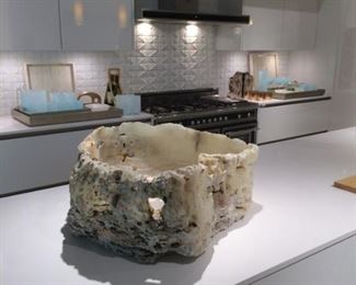 Onyx and calcite bowl featuring organic, rough-edged outer side. 28" x 24" x 10" Would be beautiful with orchids or succulents or impressive on a table or counter $425