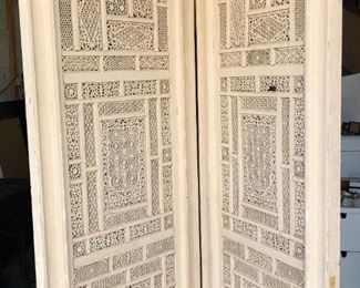Set of 4 hand carved Indian screens. Underneath the paint these are made of mahogany featuring brass inlays design $1200 for the set of 4 30" w x 81" tall x 4" deep