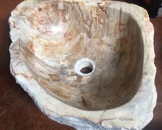 Fossilized wood and stone sinks $150 - $300 dependent upon size and material