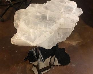 Selenite sculpture mounted on polished nickel table base