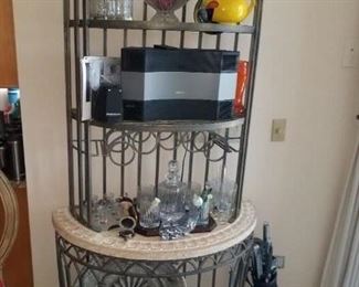 Nice wrought iron baker rack, unique design. Another, yes another BOSE wave radio w/ CD player. 