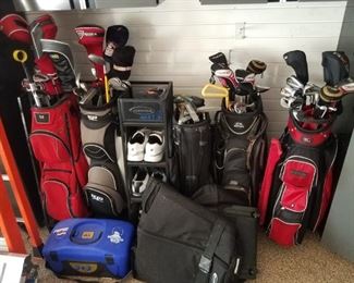 3 Sets of quality Men's golf clubs. Suncoast golf bag rack, airline bag and more.  Note:   Taylor Made Irons / 3  putters pulled from sale. 