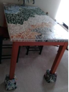 Mosaic Table with feet that makes the table taller.  Has two drawers, one locks.