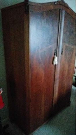 Armoire with adjustable shelving.  This has a lot of storage.  Shelving can be removed.