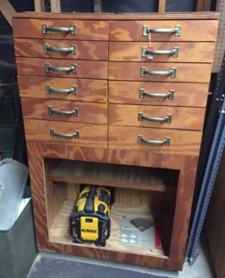 12 drawer upright tool chest with storage.