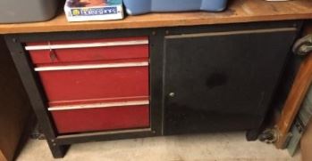 Craftsman tool cabinet with 3 drawers and storage side.