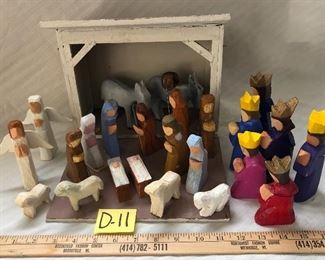 D-11, hand painted nativity and manger with many extra pieces, signed, $22.00