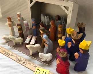 D-11, hand painted nativity and manger with many extra pieces, signed, $22.00