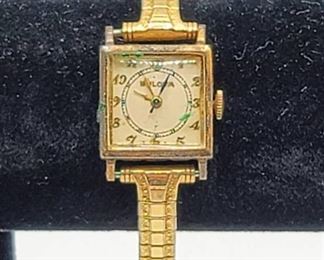 Vintage Women's Bulova Watch 10K GF Top Caps, Engraved with date 5/10/44 - Speidel stretch wrist band.