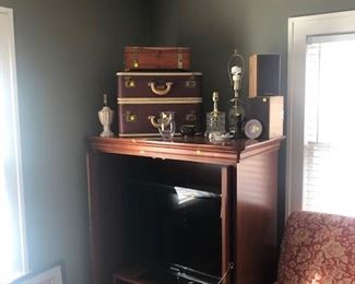 luggage wooden box, tv stand and flat screen