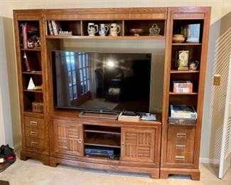 newer 3 piece entertainment console, Vizio smart TV, Alabama collectibles