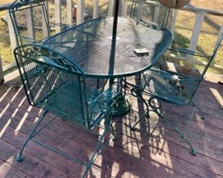 wrought iron patio table with 4 chairs