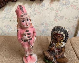 Two chalkware figurines - a majorette and an Indian chief