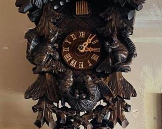 Rare German Black Hills cuckoo clock with carved owls, squirrels and birds with Black Forest pinecone weights - excellent!