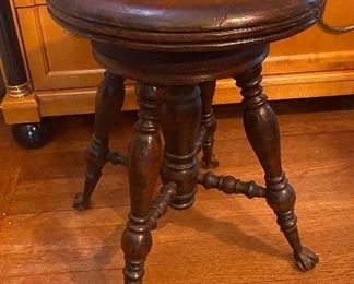 Antique piano swivel stool with ball and claw feet