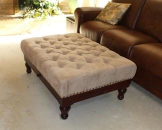 Side View Tufted Ottoman with Wood Detail