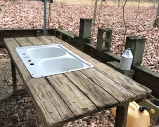 Great outdoor table with sink... one of many great farm tables avavilable.