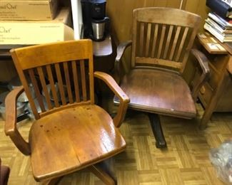 Pair of rolling lawyer chairs. Fantastic shape.