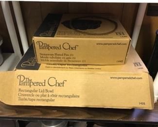 Pampered chef items, new in box, Bundt pant and casserole dish