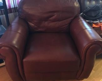 Pair of club chair and ottoman that matches sofa.