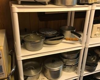 Tons of pots and pans and cooking items.