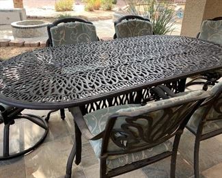 Oval Patio Table w 3 Swivel Chairs and 4 Arm Chairs