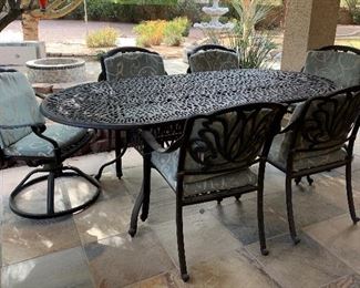 Oval Patio Table w 3 Swivel Chairs and 4 Arm Chairs