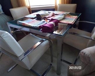 metal table w/glass top & 4 chairs