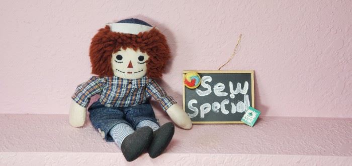 https://www.auctionninja.com/am-auction-estate-sales/product/mini-raggedy-andy-and-sew-special-ornament-287.html