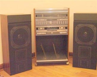 23. BSR Stereo System on Rolling Record Rack and with 2 Speakers Cabinets