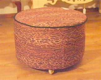 25. Vintage Ottoman with Cheetah Upholstery on Shepherd Casters
