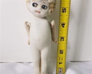 Ceramic Baby Doll. With Moveable Arms Tied with String. Made in Japan.