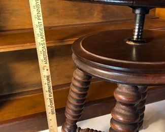 Clearance Lot #11: Antique claw foot swivel piano stool & antique Book. $100 for both. Shelf not included.