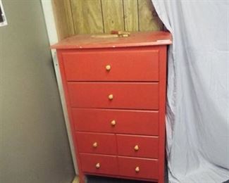 Orange chest of drawers, 28 1/2'' W x 15 1/2'' D x 46'' T.