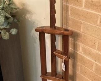 One of two adjustable candleholders - - - made by Mr. Tomlinson
