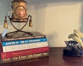 Books; candleholders; porcelain bird