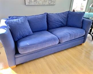 $295 - Distressed, denim two cushion sleeper sofa.  30"H x  86.5"W x 38"D (seat height 19"H) - as is - some sun damage